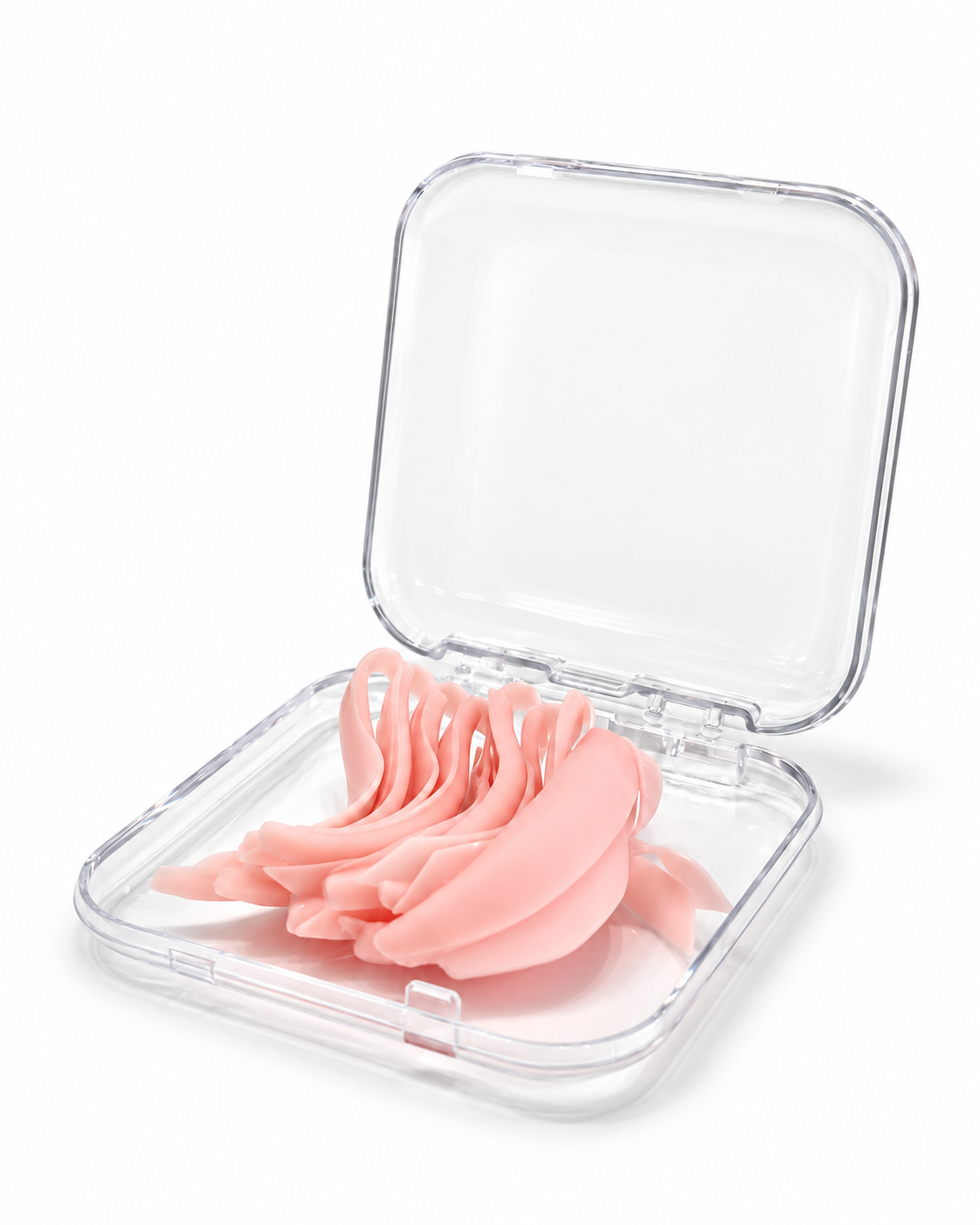 Caja acrílica transparente de 75 × 75 mm abierta, mostrada con moldes rosas de lifting en su interior.